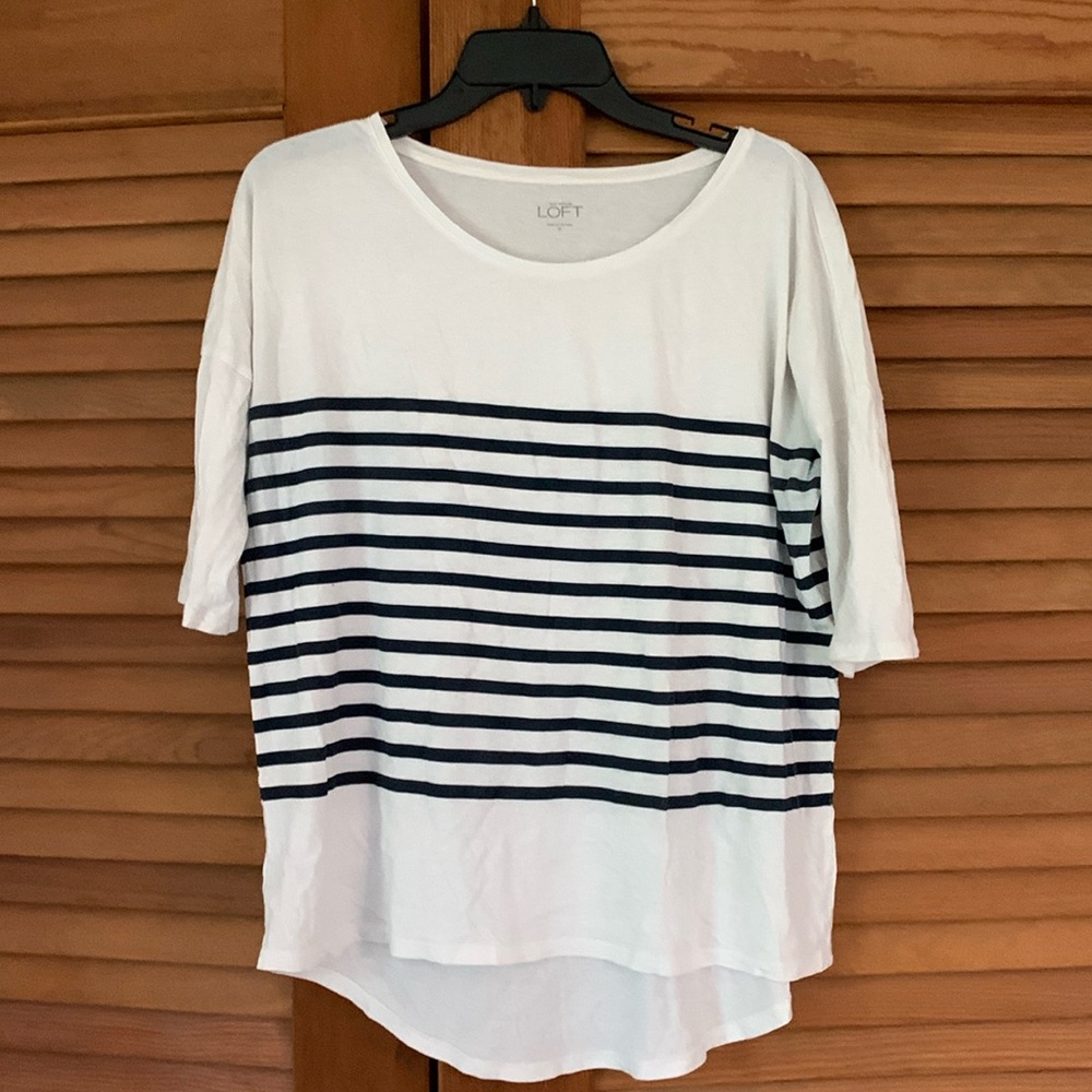 T-shirt from the loft, sleeves are a bit longer than a normal T-shirt